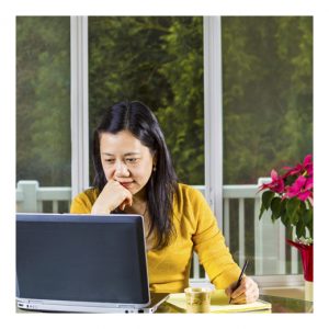 woman looking at computer