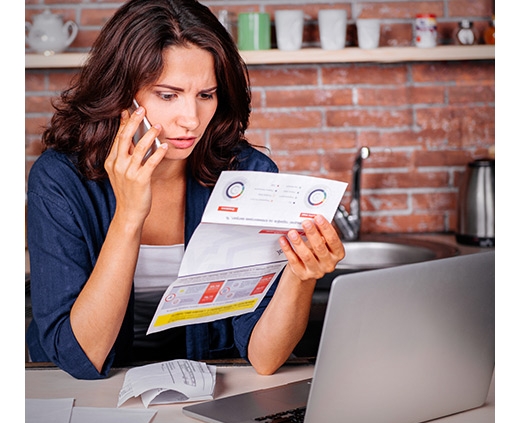 woman looking at bill